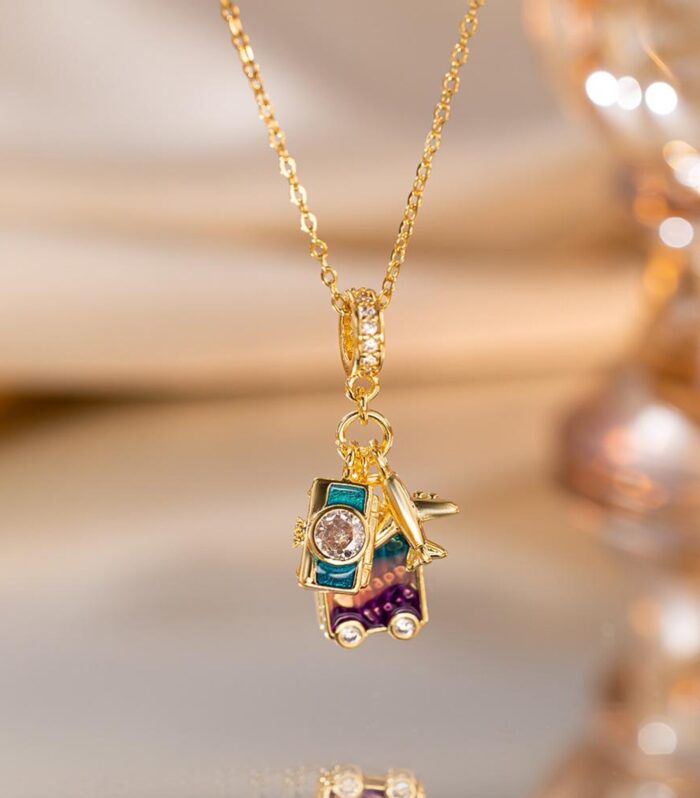 Travel Charm Gold Necklace – Airplane, Camera & Suitcase Pendant